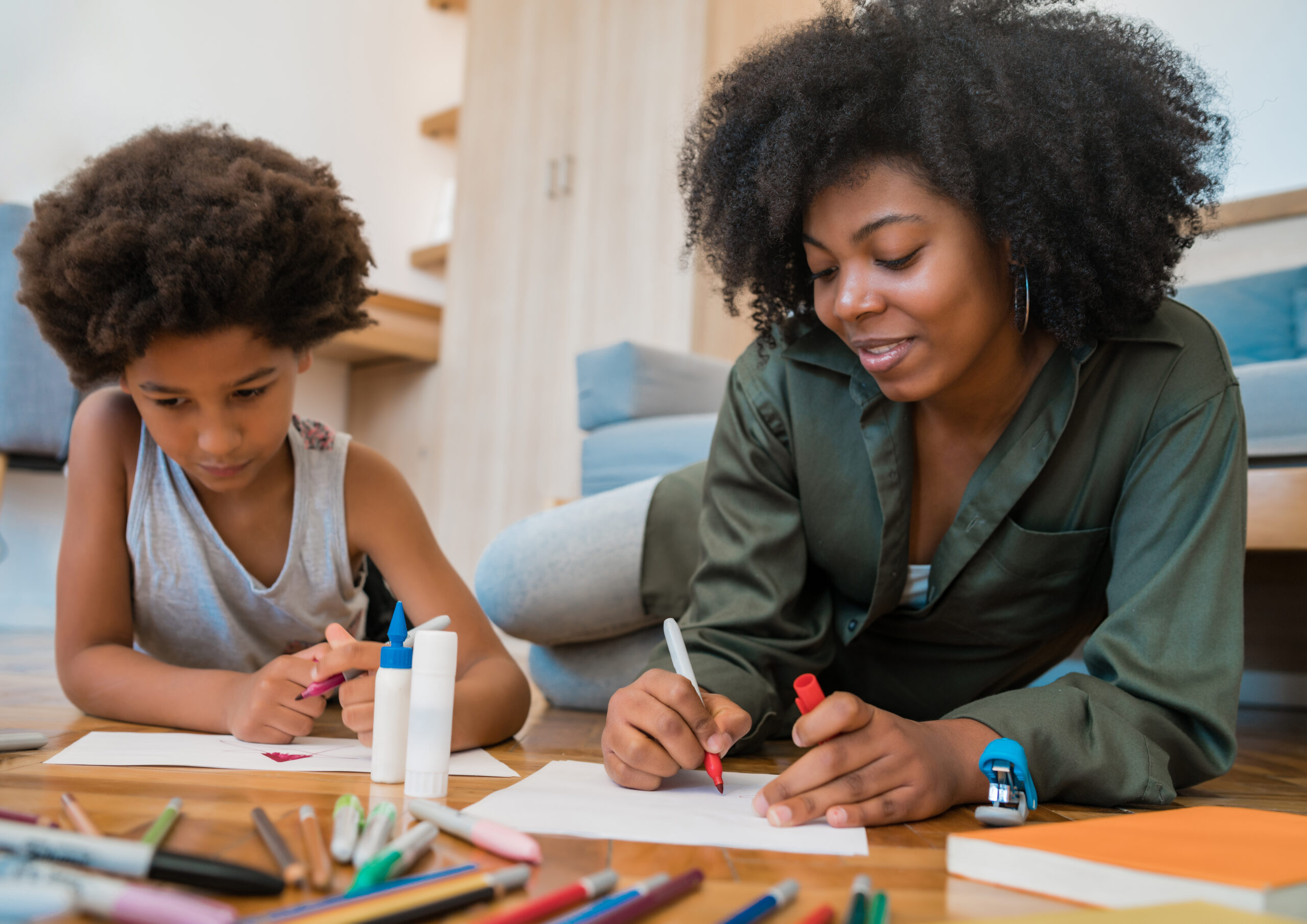 mom working with daughter. 