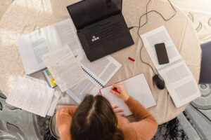 Student with Textbooks